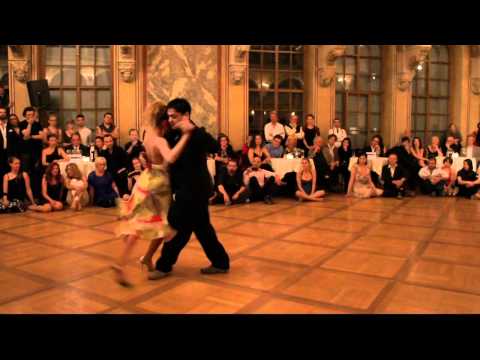  Carlos Espinoza  and  Noelia Hurtado Pitruzzella  are  dancing  to  the  vals  "  Con Tu Mirar  "  by  Enrique Rodríguez  at  TangoAmadeus  in  2012