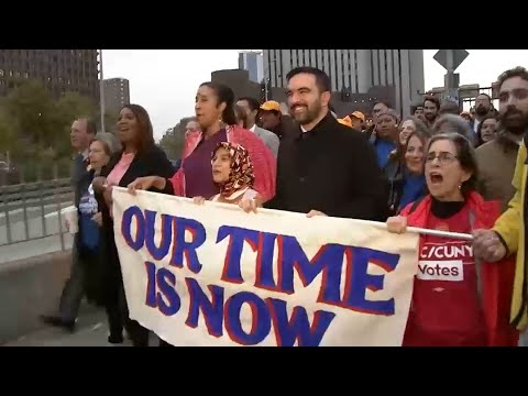Mamdani walks across the Brooklyn Bridge with supporters