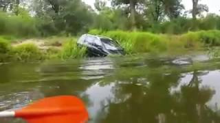 Car Crashes into River