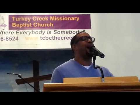 Pastor AK Thomas singing "Pass Me Not"