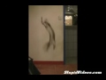 Cat Catches Bat