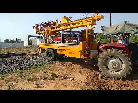 tractor crossing railway track with RIG #TRACTOR #RIG #RAILWAY