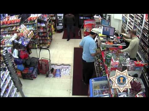 Armed Robbery Surveillance Video - Public's assistance needed identifying a suspect