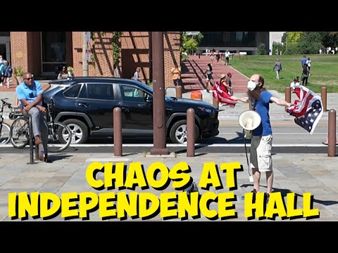 MAN DESTROYS AMERICAN FLAG IN FRONT OF POLICE - PHILADELPHIA UNEDITED 