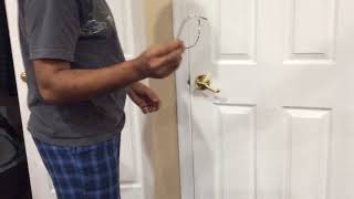 Open a locked closet door with a piece of steel wire