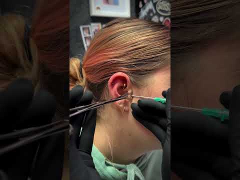 Getting both a Helix and Tragus piercing at the same time 🤩