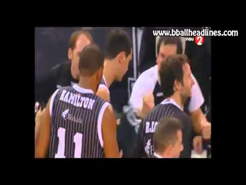 Nikos Zisis beats the buzzer from half court