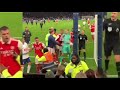 Spurs fan kicking Arsenal goalkeeper Aaron Ramsdale