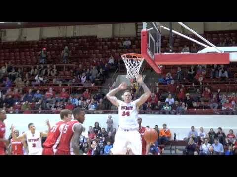 Nick Minnerath University of Detroit Mercy Titans dunks on defender