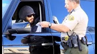 An Indian-origin guy caught on tape while bribing a police officer