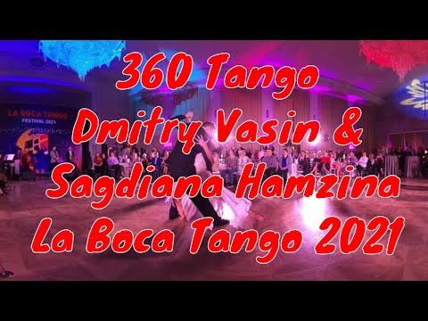  Dmitry Vasin  and  Sagdiana Hamzina  are  dancing  to  the  tango  "  Los Mareados  "  at  La Boca Tango Festival  in  2021