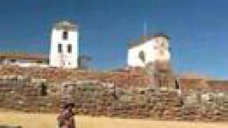 preview picture of video 'Old Woman, Dog, Colonial Church, Chinchero, Peru'