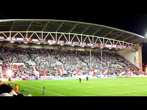 Wigan South Stand flags and crowd World Club Challenge