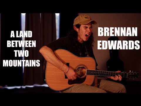 A Land Between Two Mountains - Brennan Edwards