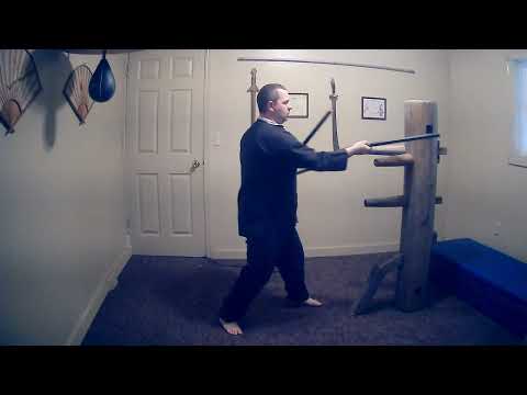 Chuan Fa Techniques with San Jie Gun on a Wing Chun Dummy