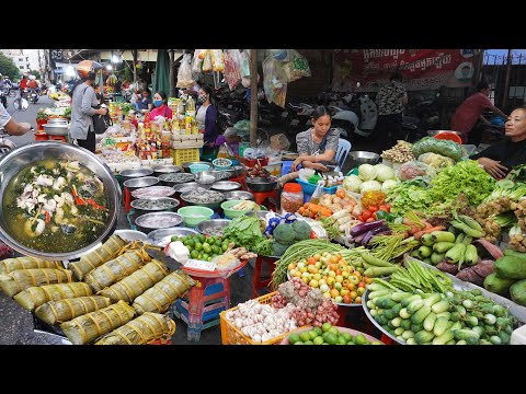 Evening food market scenes, grilled fish, dinner dishes, fresh food and fruits for sales, Phnom Penh