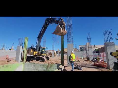 Slide Rail Shoring System Install (Driving Column Into Ground)