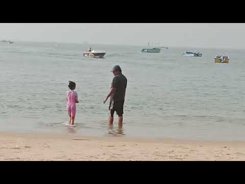 sumedha enjoying playing in the beach water with her dad at Goa on Dec 20 2023