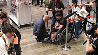 Doug Bowser Signs Bowser amiibo for Fan at Nintendo NY
