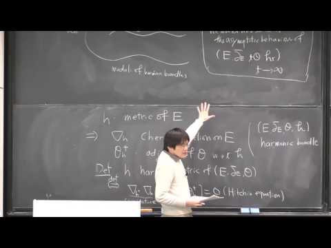Asymptotic behaviour of certain families of harmonic bundles on Riemann surfaces - Takuro Mochizuki
