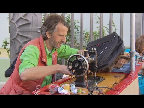 Man uses sewing machine to mend struggling neighborhood