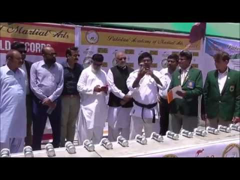 64 can crushed by head in one minute guinness world record by rashid
