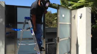 Stainless moderne gate in the installation process.
