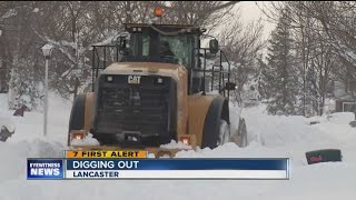 Snow storm ends, Lancaster residents dig out for supplies