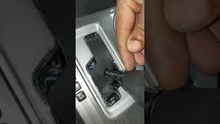 remove knob  in a 2016 nissa  murano . remover la Palanca  de cambio 2016 nissan murano