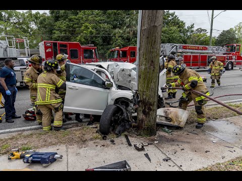 Jacksonville Fire Rescue Department responds to car vs pole with 2 trapped