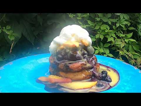 Sweet french toast: soaked in creme anglaise then fried with mixed berry comopte