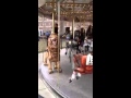 Lucas rides the Carousel
