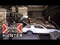Forgotten warehouse full of cars must go