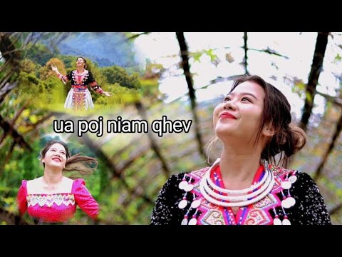 Ua Poj Niam Qhev (singing )
