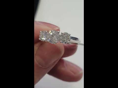 3 diamond prong claw set diamond ring platinum setting and 18K band