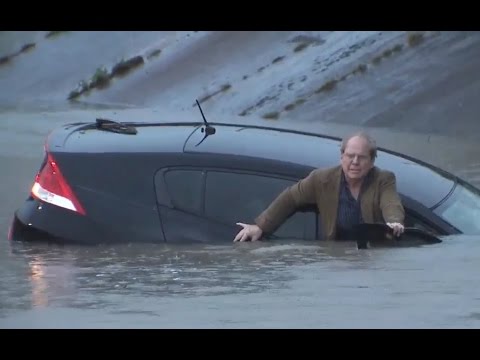 This Reporter Will Rescue A Man From A Flood On Live TV, But He Won't Be Happy About It