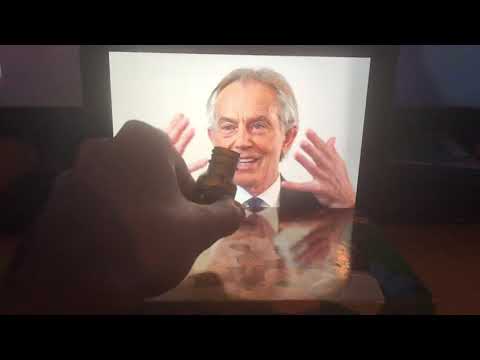 Tony Blair sniffing Buzz brand poppers (Amyl Nitrates) after a long day of commuting war crimes