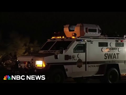 Law enforcement activity happening in Nancy Guthrie's neighborhood