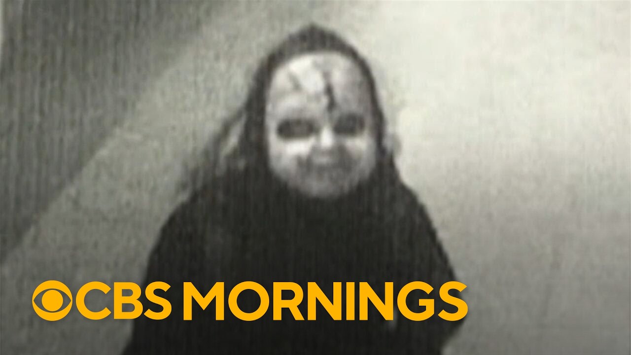 Man in Chucky-style mask chases woman, asks her if she's "ready to die"