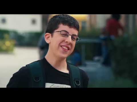 Superbad 2007 official trailer still with Seth, Evan and Fogell walking across the parking lot