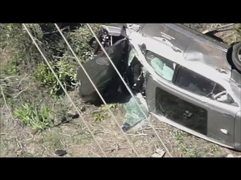 Tiger Woods 'awake, responsive' after surgery following car crash