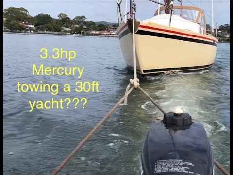 Tiny outboard big boat 3.3hp Mercury towing yacht