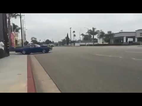 68 Road Runner doing a burnout with a 572 Keith black hemi