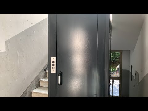 Tiny Auros elevator at 22 Via Caffaro in Rome, Italy