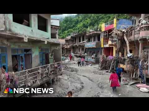 Urgent race to rescue survivors after flood disaster