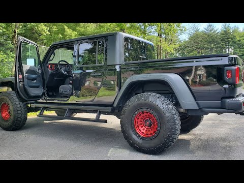 jeep gladiator with power steps. Aries power running board. Rock Slider upgrade