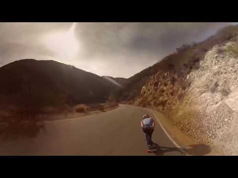 Speed through a canyon on a longboard in VR