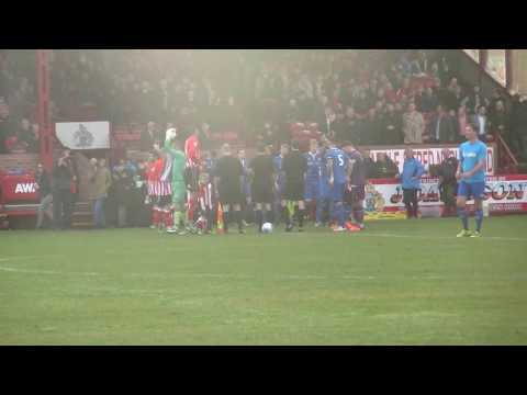 Altrincham and Salford emerge from the tunnel