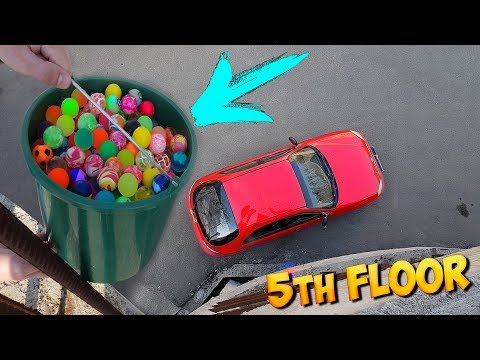 DROPPING 500 BOUNCY BALLS ON MY CAR! Video