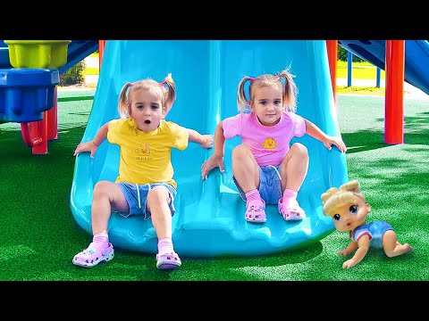 Alice and Baby Doll play on the Outdoor Playground